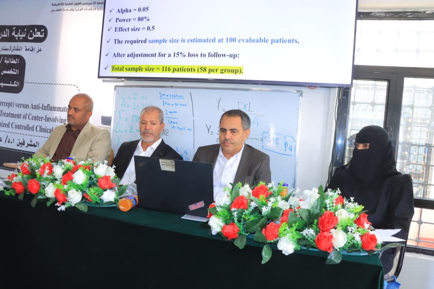 Panel of four speakers seated at a conference table adorned with red and white flowers; a laptop is open in front of the second man, a whiteboard behind them, and a projected slide on screen above with checklist items.